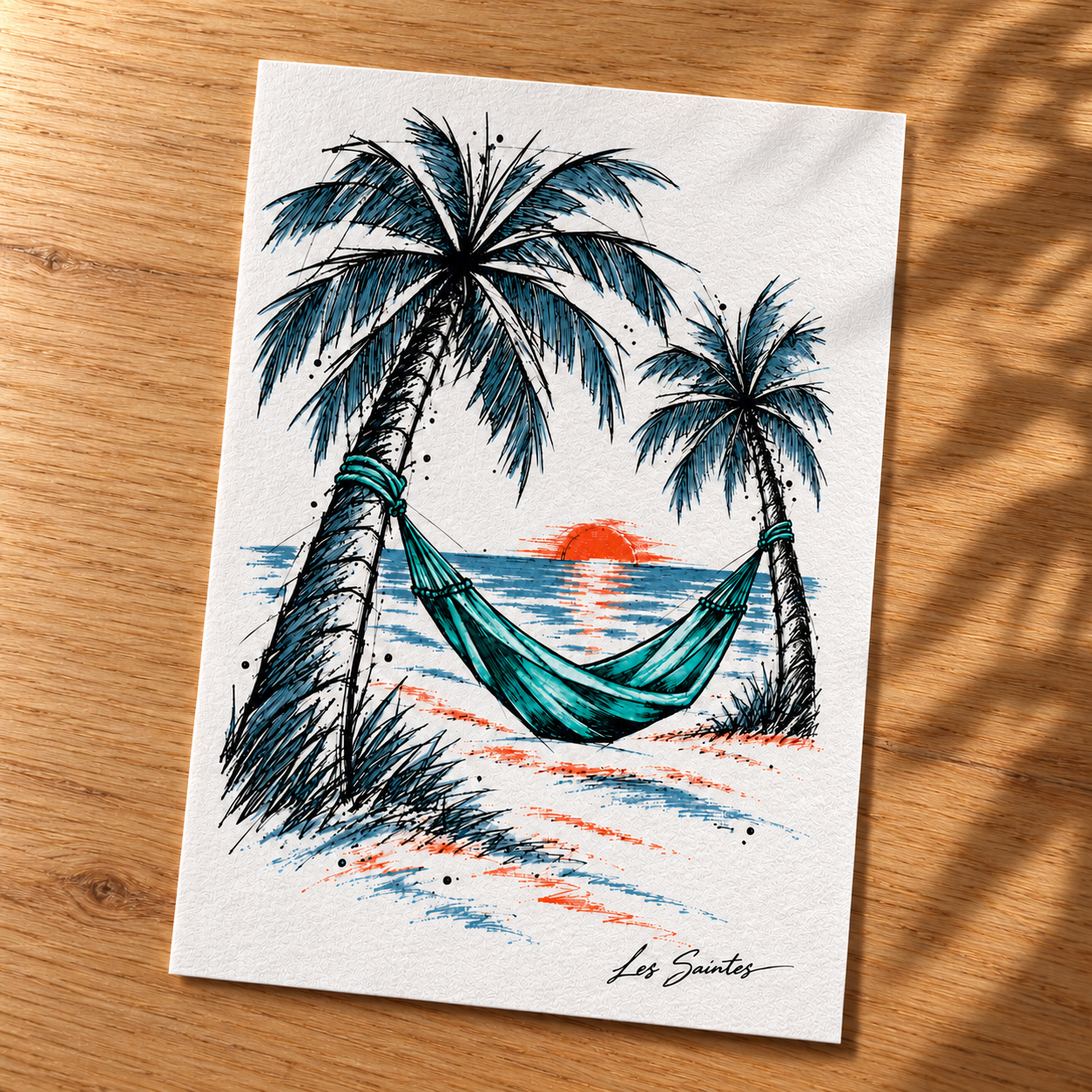 Carte postale — Hamac tropical, papier texturé posé sur une table avec une légère ombre de feuillage — Atelier Karaïbes, Les Saintes